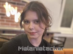 Melanietacker